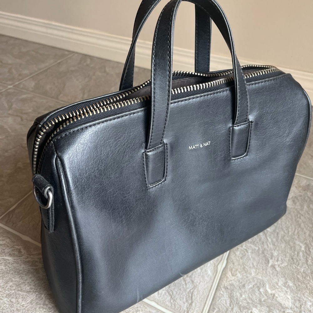 Matt and Nat black bag